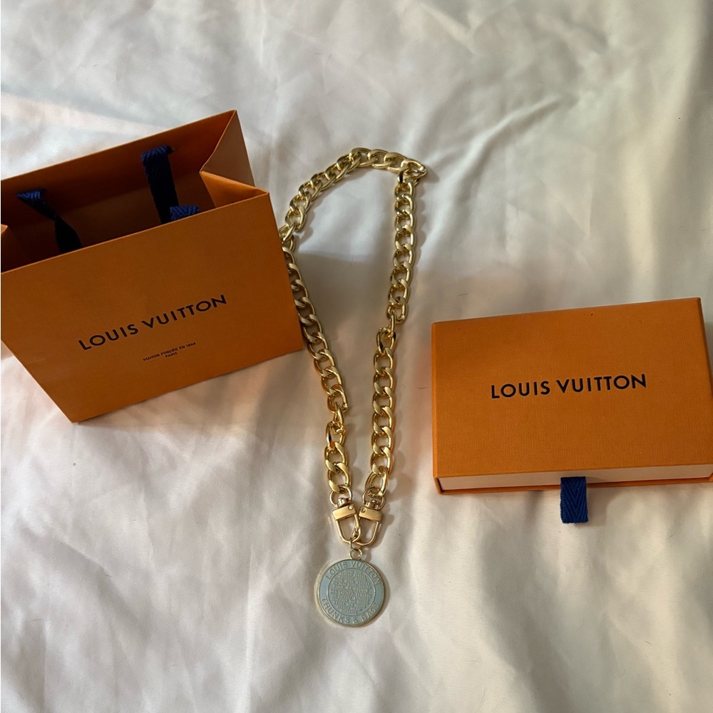 Box & bag Louis Vuitton charm is authentic size of a quarter not the small 1 lv